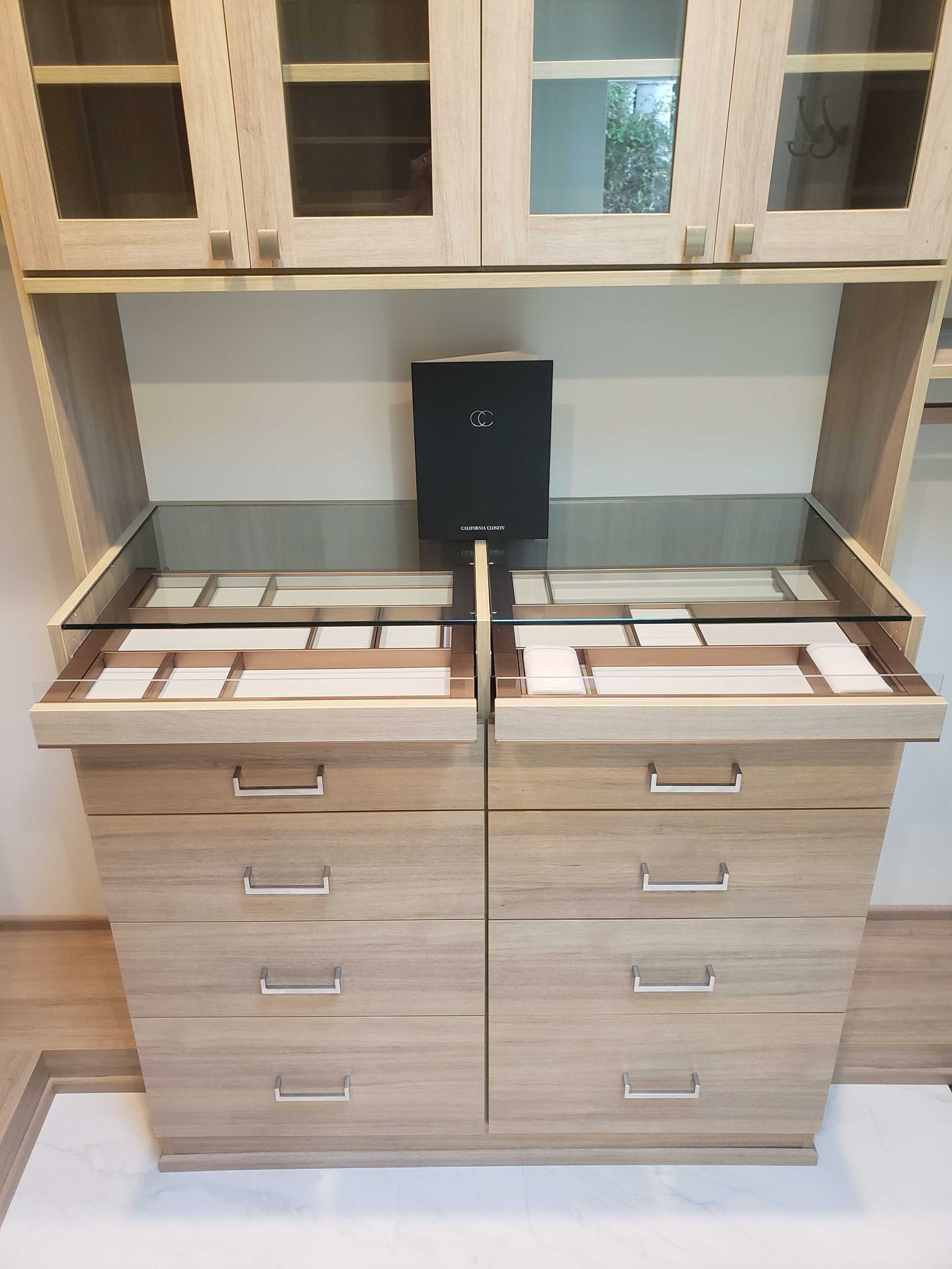 Jewelry Drawer in Quiet Grove Custom Tan closet shelving with jewelry drawer for accessories by California Closets San Diego, California.