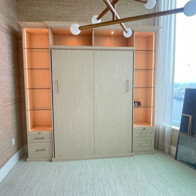 Design That Doubles as Décor Virginia Beach – Wall bed – Light wood wall bed with integrated shelving and accent lighting