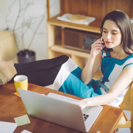 Business woman managing her accounts online