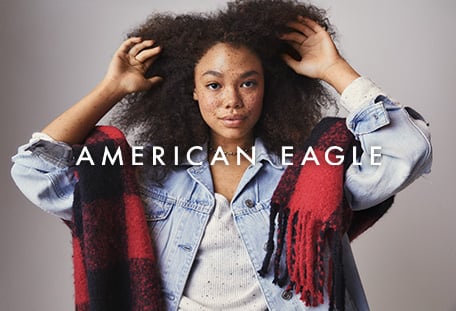 woman in denim jacket wearing scarf