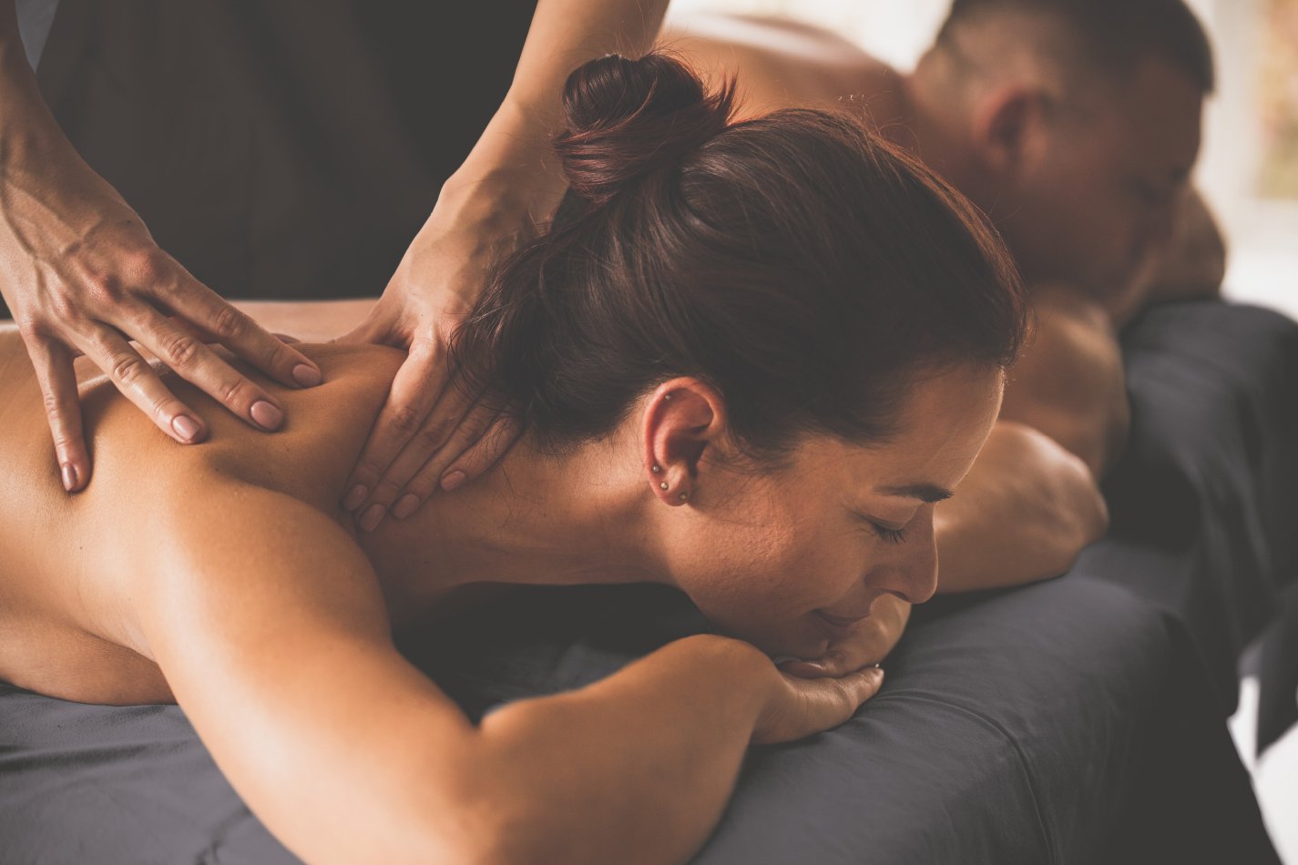 A couple getting a couples massage for Valentine’s Day.