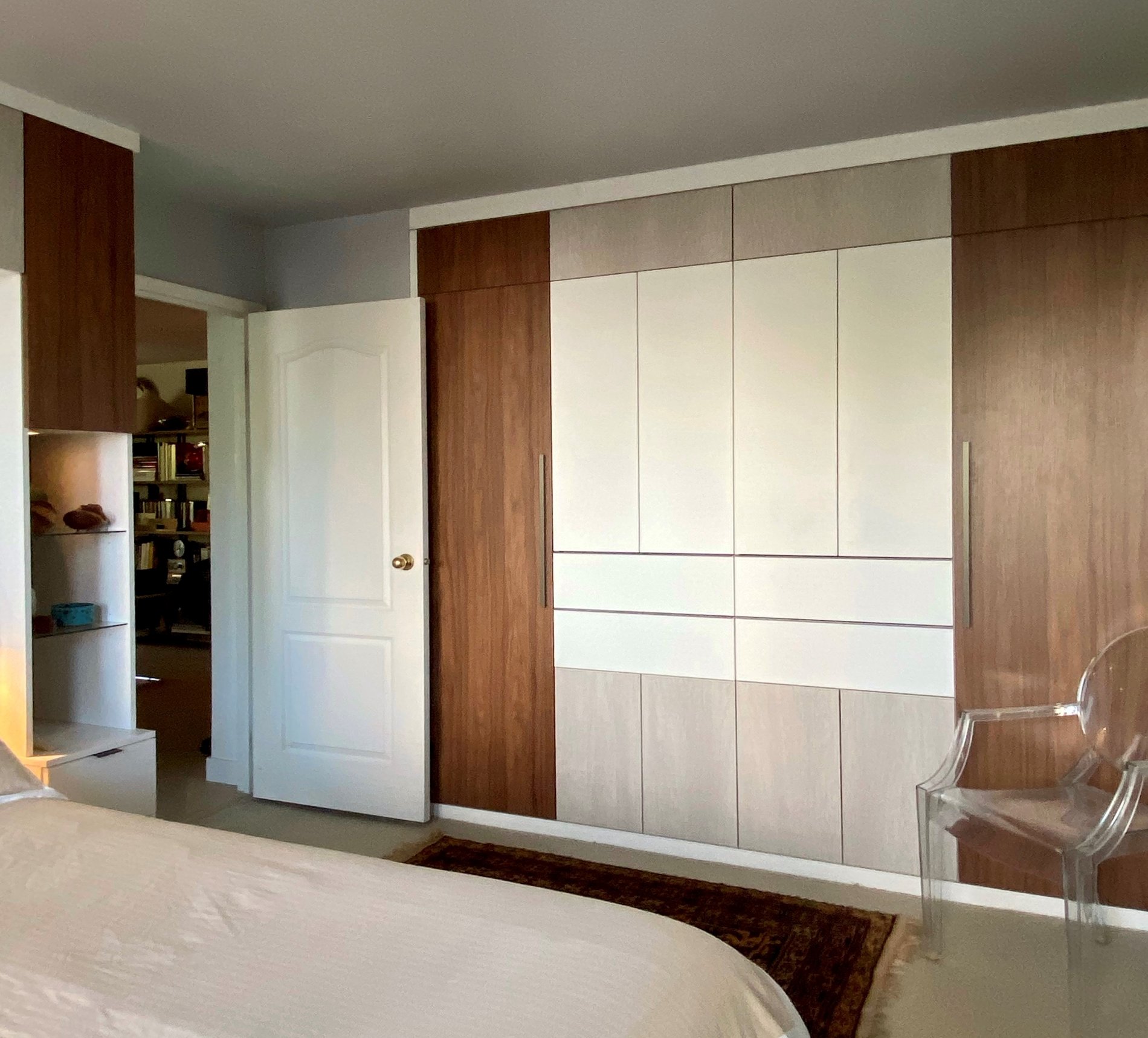 Built-in wardrobe full view of wardrobe made to appear flush with the wall