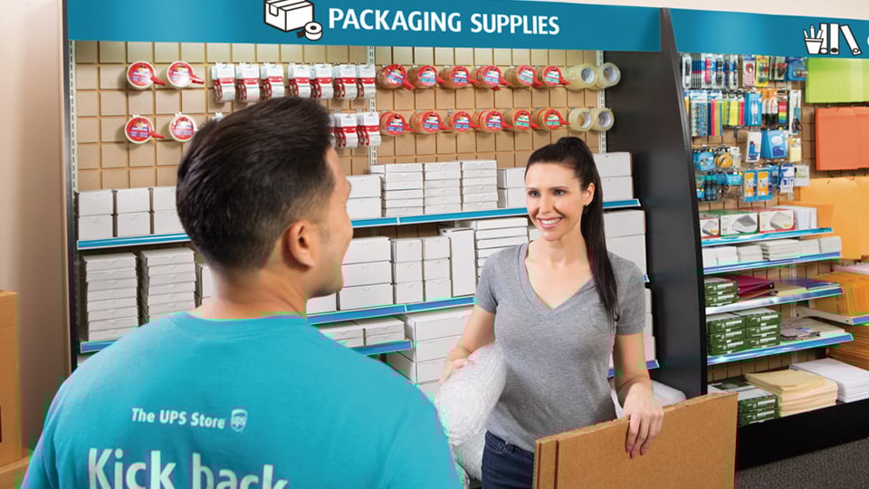 packaging supplies being handed to customer