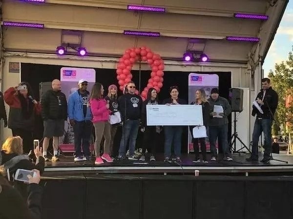 Handing off the big check to American Cancer Society!
