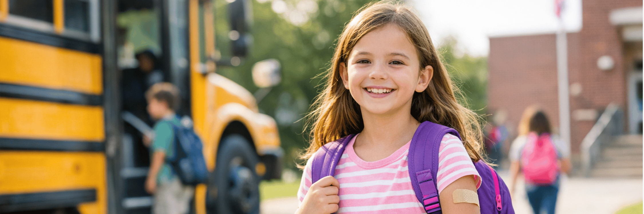 girl going to school after getting her vaccine