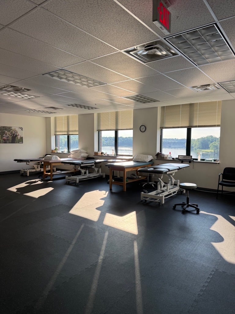 ME-Topsham-MVPT patient care area showing PT Tables and equipment.