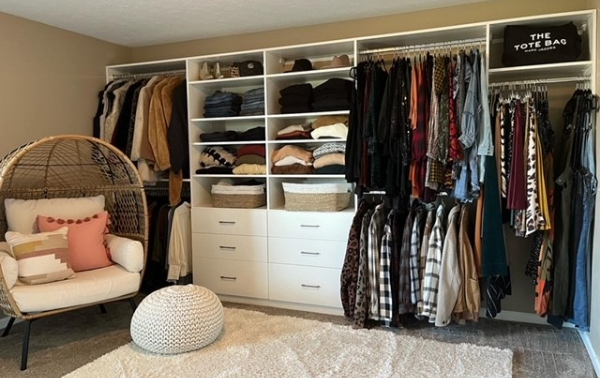 Bedroom Closet Bedroom closet with hanging space, storage drawers, and shelving.
