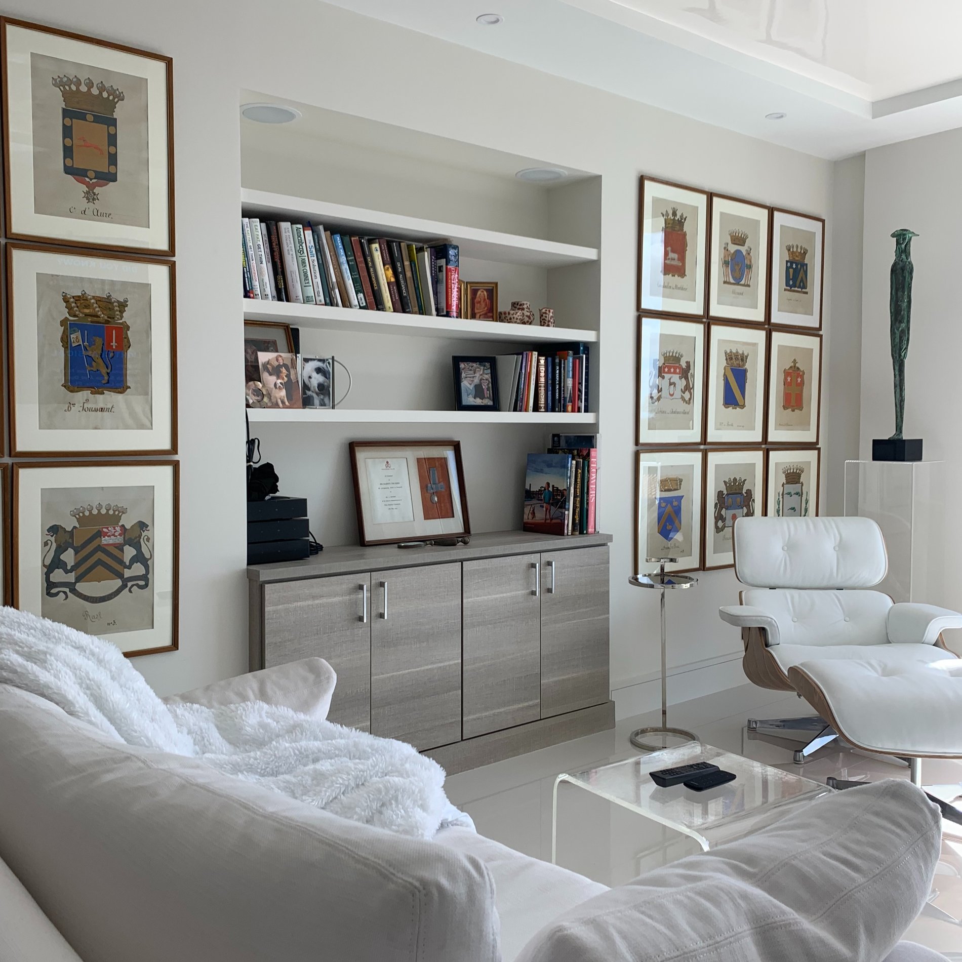 Sleek and Elegant Pietra with White Floating Shelves and Slab Doors PIETRA CABINETS with WHITE FLOATING SHELVES and SLAB DOORS