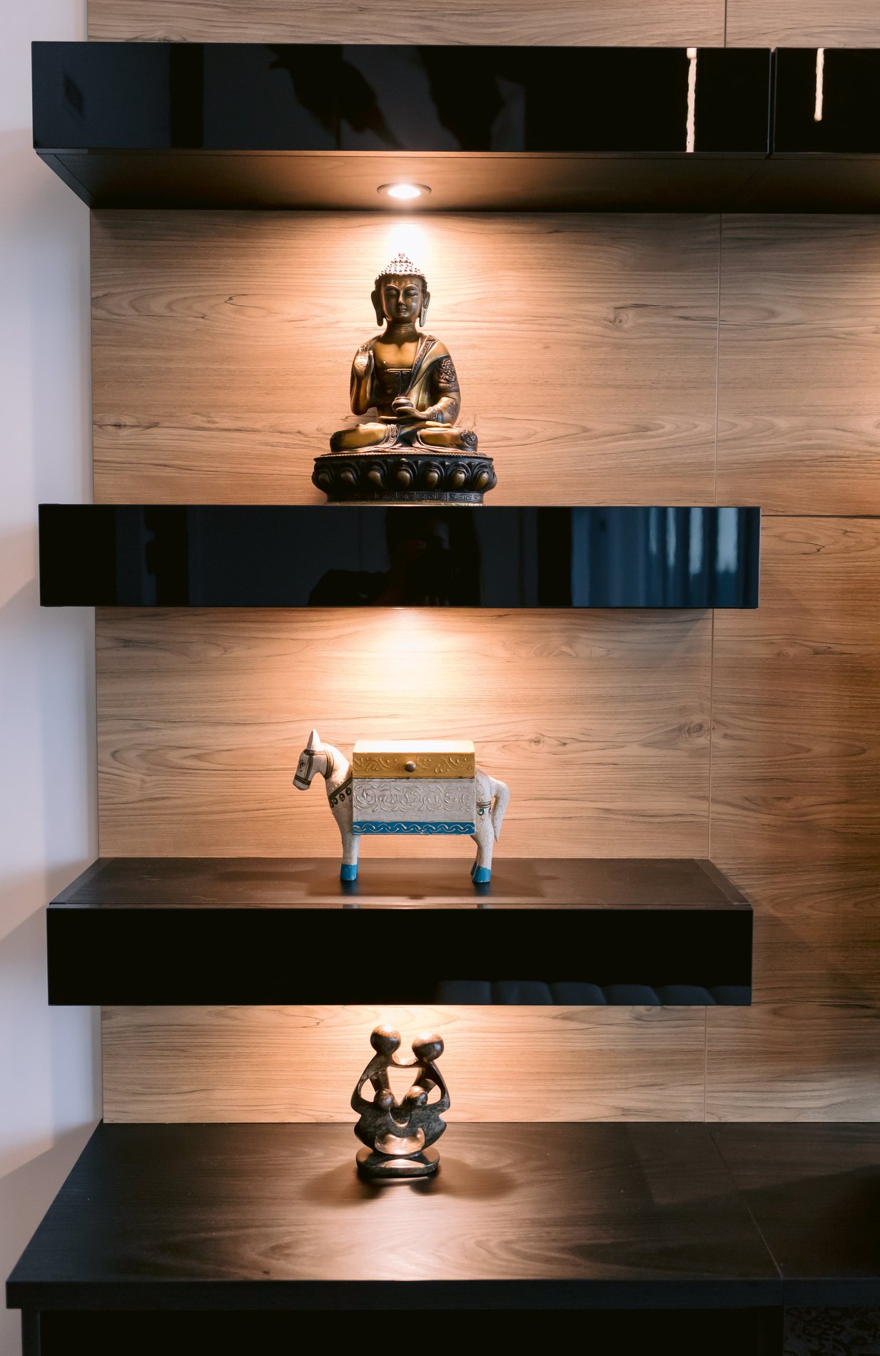 Display shelves with lighting Close up of acrylic display shelving built into media centre.