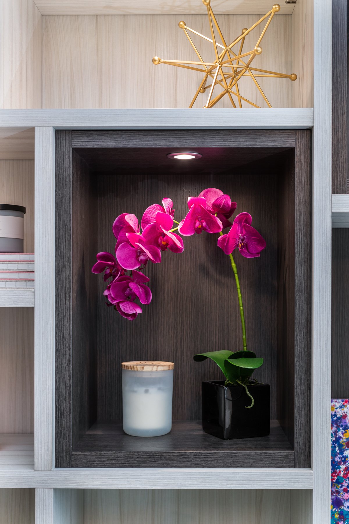 Home Office Shelving Home office shelving in a light wood grain finish with a dark wood grain accent and lighting.