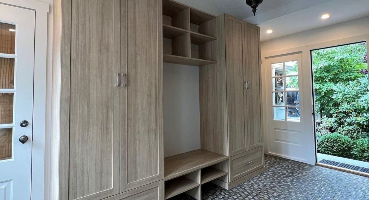 Light Brown Mudroom California Closets New York custom closets Nassau County NY laundry room ideas mudroom cabinet storage cabinet garage laundry room shelving ideas
