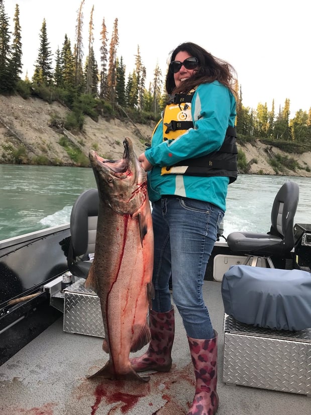 Our office manager Cheryl with her personal record 52 lbs. King Salmon