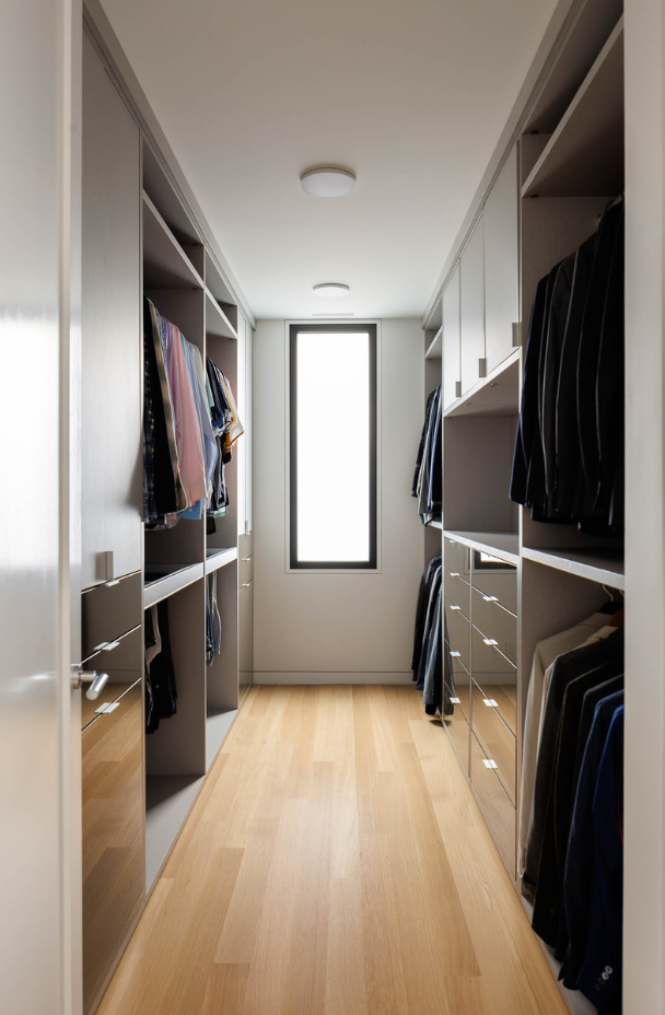 Men's Sleek Walk-in Closet Img 8 - California Closets Westchester County New York Walk-in Mens Closet with Double Hanging Everstyle Custom Pant Hanging