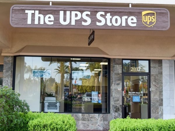 front of the ups store at 2037 W Bullard Ave