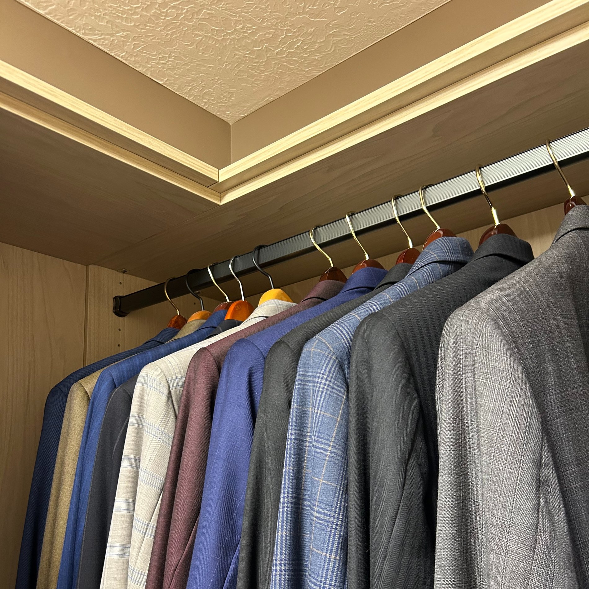 Walk In Closet Custom walk in closet with optimal hanging space.