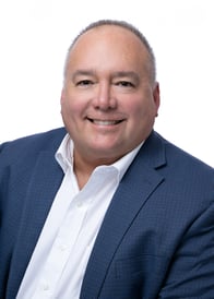 A headshot of Goosehead agent Tony Puente
