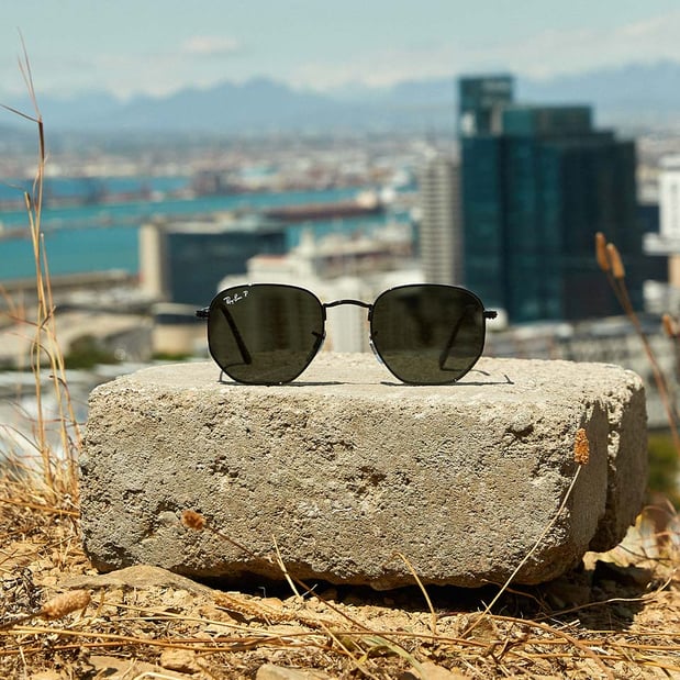 Ray-Ban sunglasses with city in background
