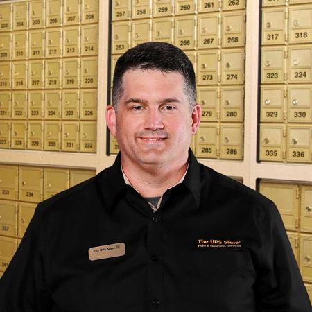 Male store associate at The UPS Store in North Myrtle Beach