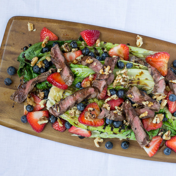 grilled romaine steak and berry salad with walnuts