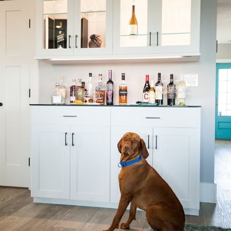Custom Bar with Glass Doors, Shelves, and Countertop