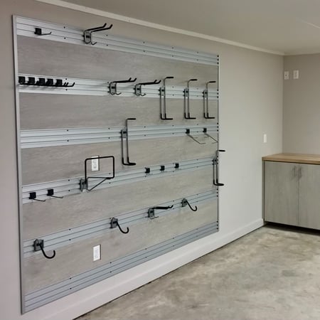Custom storage in garage fusion track wall system garage organization California Closets New Orleans & Gulf Coast