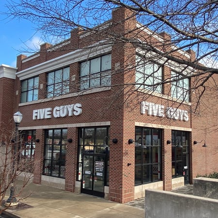 Exterior photograph of the Five Guys restaurant at 8231 Calumet Avenue in Munster, Indiana.