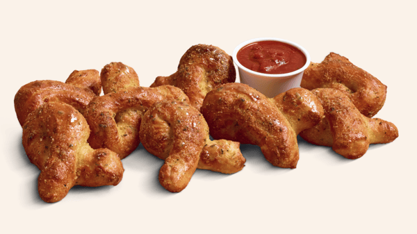 Oven-baked bread bites handmade from fresh buttery-tasting dough and seasoned with garlic and Parmesan. Available in 16-piece or 32-piece orders. Add marinara or your favorite dipping cup for an additional charge.