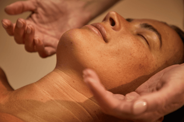 Woman receiving a relaxing Woodhouse Spa treatment.