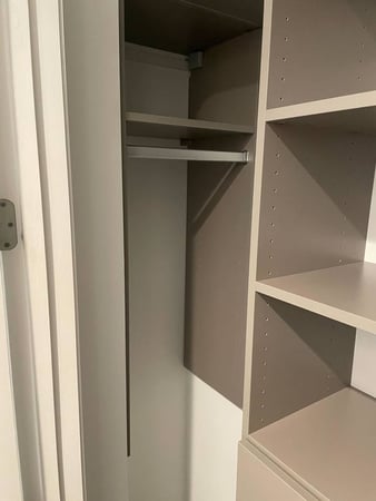 Closet with continuous kickplate bottom treatment