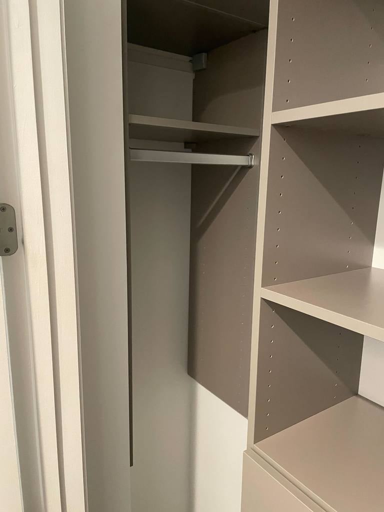 Closet with continuous kickplate bottom treatment