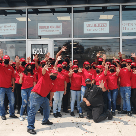 The crew at the Five Guys restaurant at 6017 Oxon Hill Road in Oxon Hill, Md.