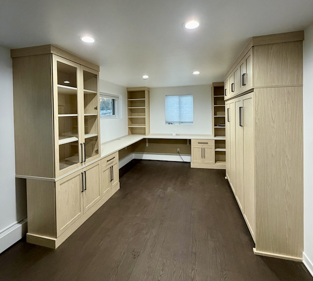 Custom home office desk with countertop and drawers and shelves