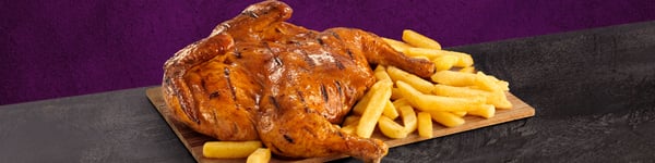 A Flame-Grilled full chicken with a large portion of Famous Hand-Cut Chips from Steers®  and 4 fresh mini loaves, against a purple and grey background.