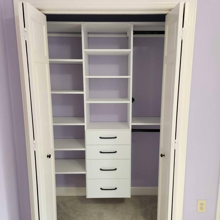 Built-in shelves and drawers designed for efficient storage.