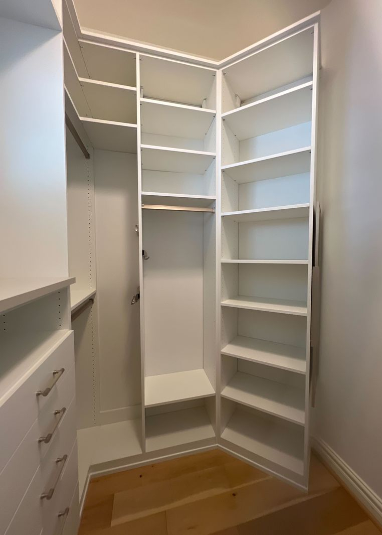 Virginia Beach - Custom closets - Corner closet design with open shelving and hanging rods.