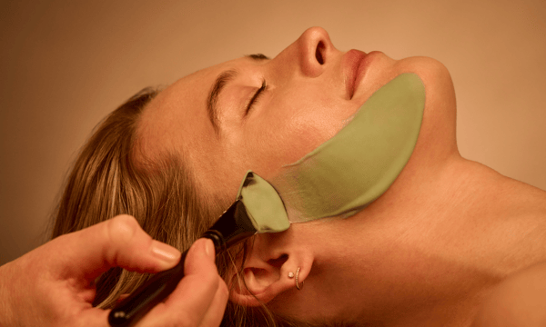 woman receiving a deep cleanse facial at woodhouse spa