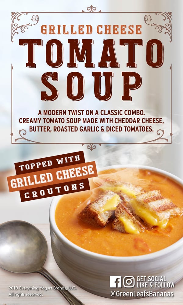 Tomato soup topped with grilled cheese croutons