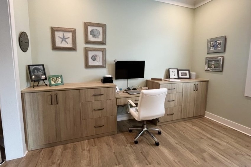 Brown cozy office space with custom cabinets and drawers California Closets Pensacola & Panama City, FL
