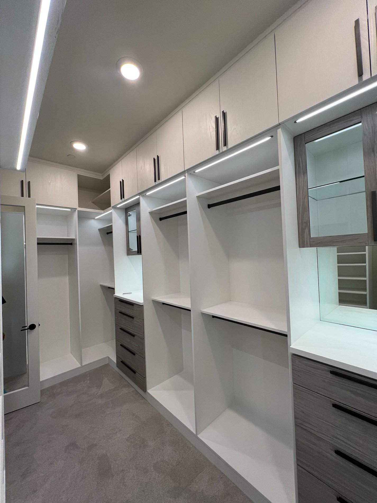 Custom white walk-in closet