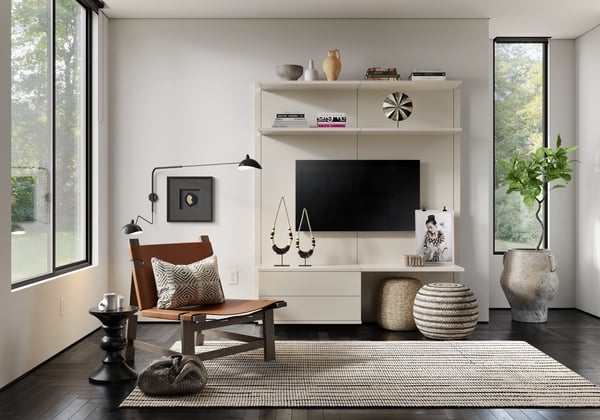 Modern media center in Morning Light finish with floating shelves and hidden storage.