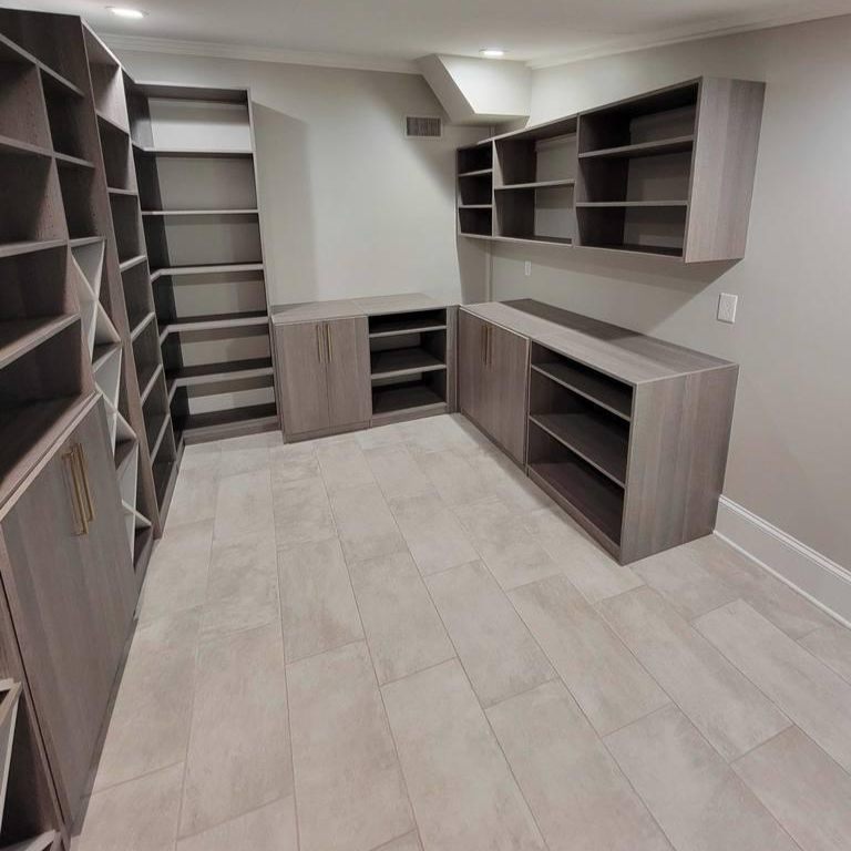 Greensboro - Custom closets - pantry with gray wood cabinets, open shelving, and a built-in countertop workspace
