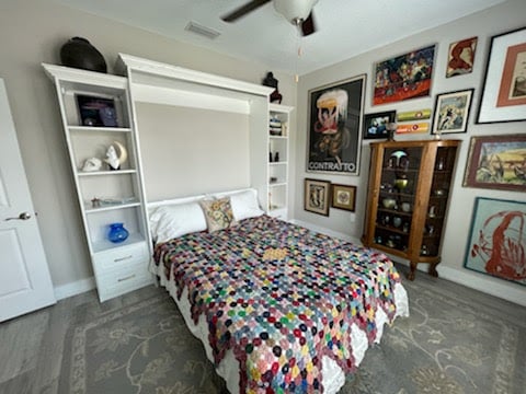 White murphy style bed with bookshelves California Closets Pensacola and  Panama City, Florida