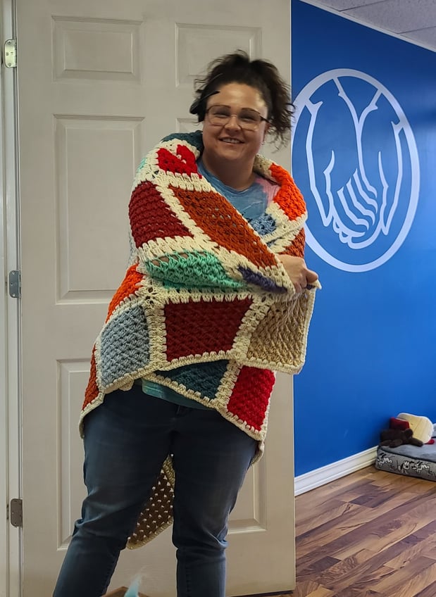 John and Judy R. are unbelievably thoughtful. Judy knitted a beautiful blanket and gave it to Beth for all the hard work she does helping them. We are so fortunate to have such amazing customers. Thank you.