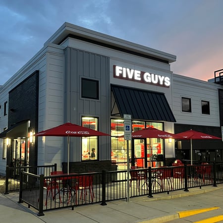 Exterior photograph of the Five Guys restaurant at 410 Herlong Avenue in Rock Hill, South Carolina.