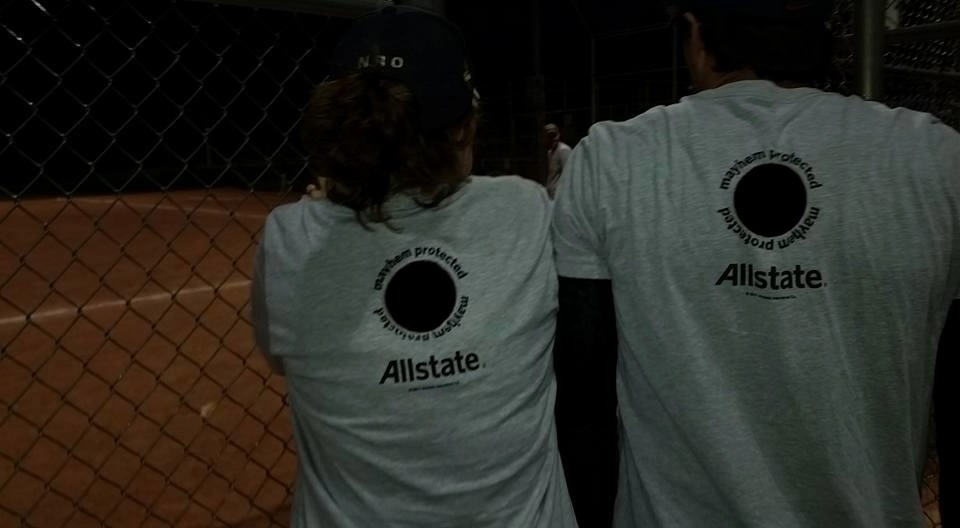Agent Becky Halstead playing softball