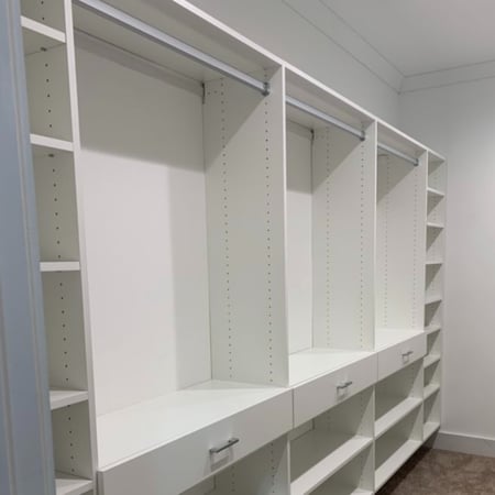 Walk-in closet custom closet organization California Closets Gulf Coast & New Orleans