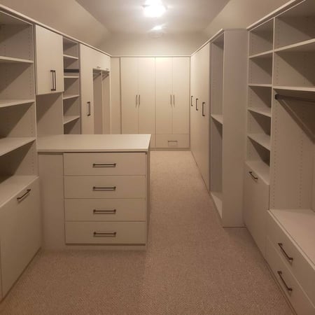 An entire room filled with drawers, cabinets, and closet space.