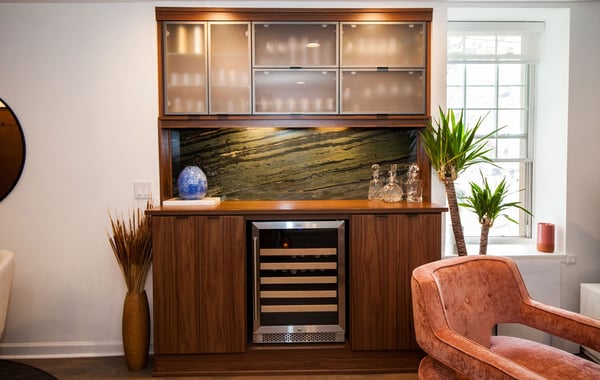 Custom Wine Bar with Decorative Backsplash, Wine Fridge, and Frosted Glass Doors by California Closets of Philadelphia and Delaware
