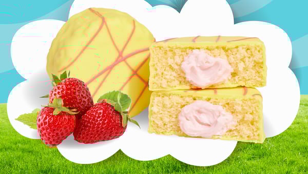 MOD Pizza's strawberry lemonade No Name Cake is on a clouded background, showcasing it's open strawberry frosting