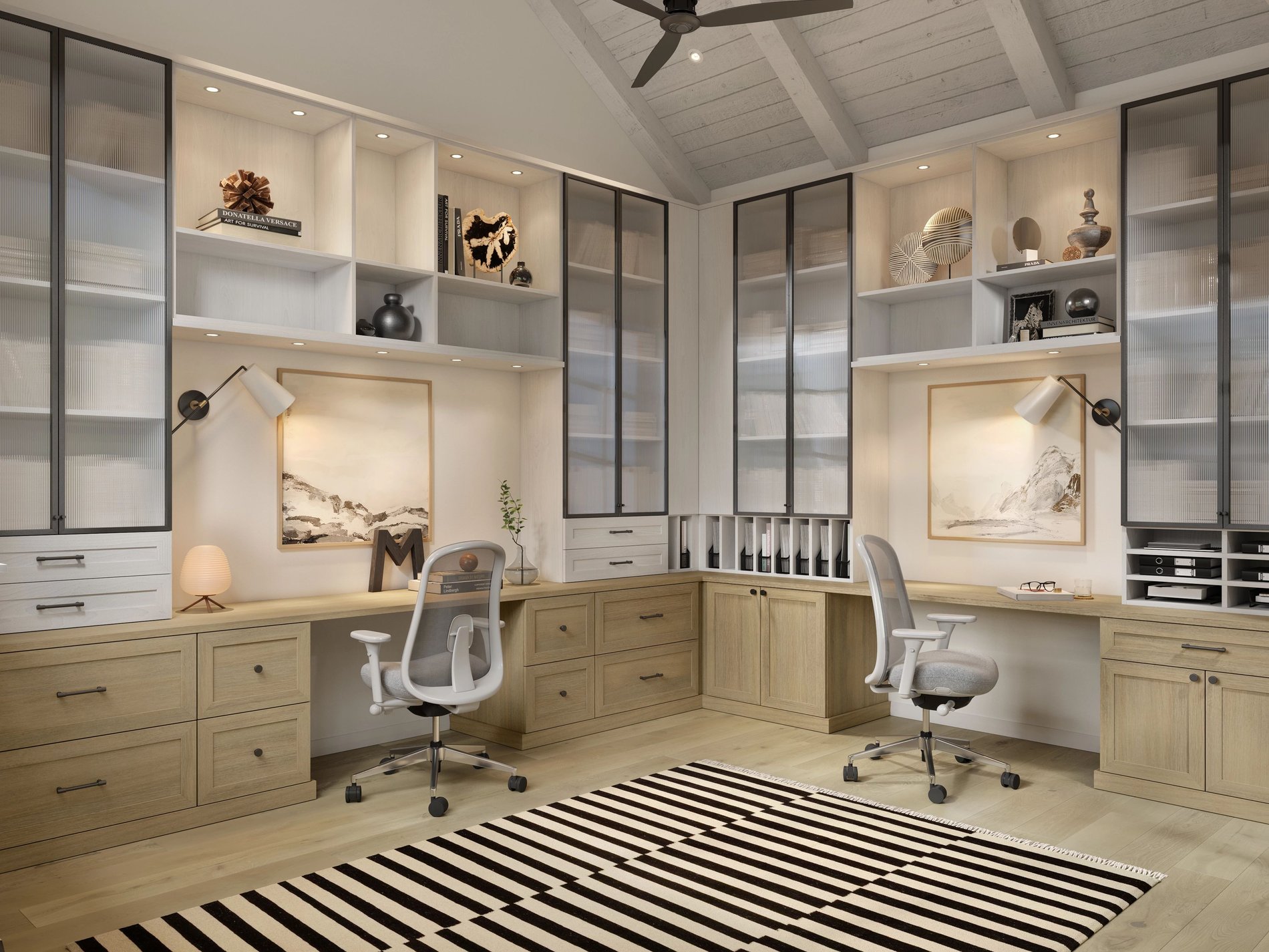 Custom built-in home office with dual work stations, frosted glass doors, puck lighting, plus drawers and cubbies for optimal organization.